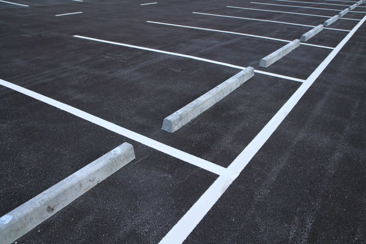 freshly resealed asphalt parking lot in Fort Myers, FL